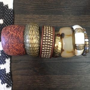 Set of gold and neutral fashion bracelets